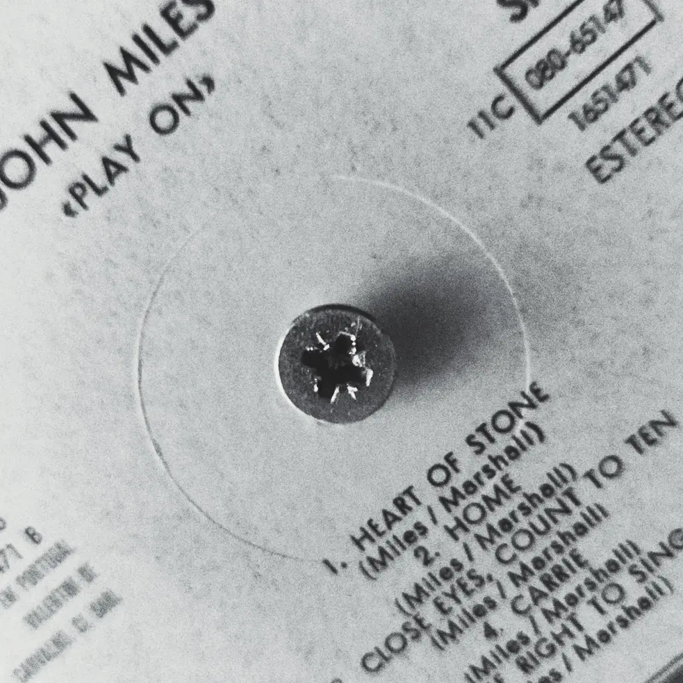 John Miles Record on a screw