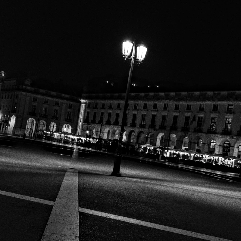 The radiation of a lamp in Lisbon's commerce square.